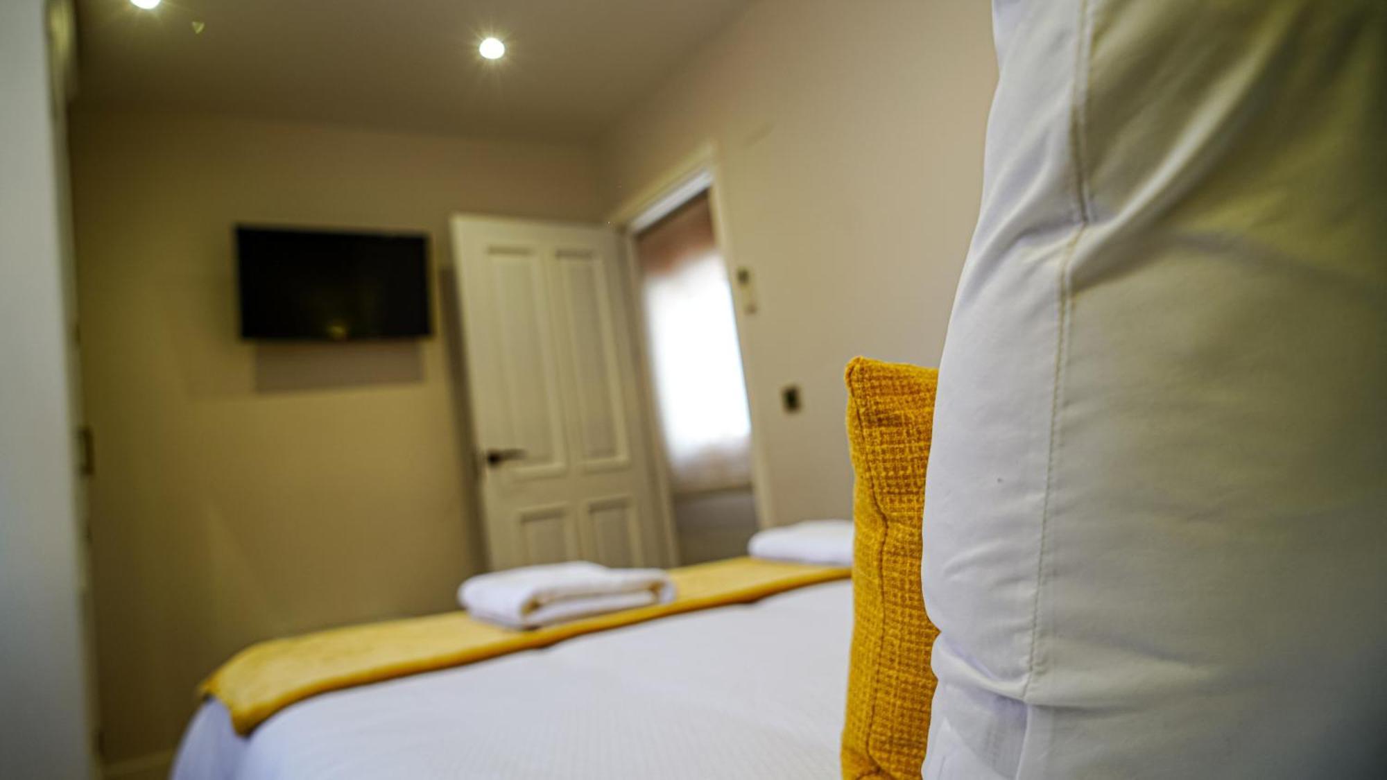 Apartamentos Puente Romano Suites 梅里达 外观 照片