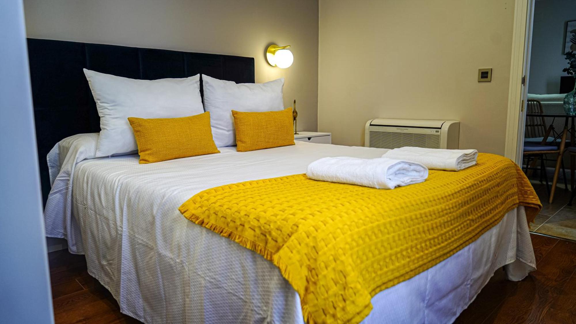 Apartamentos Puente Romano Suites 梅里达 外观 照片